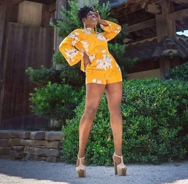 Marsha Kerr Talley in a yellow outfit and high heel shoes